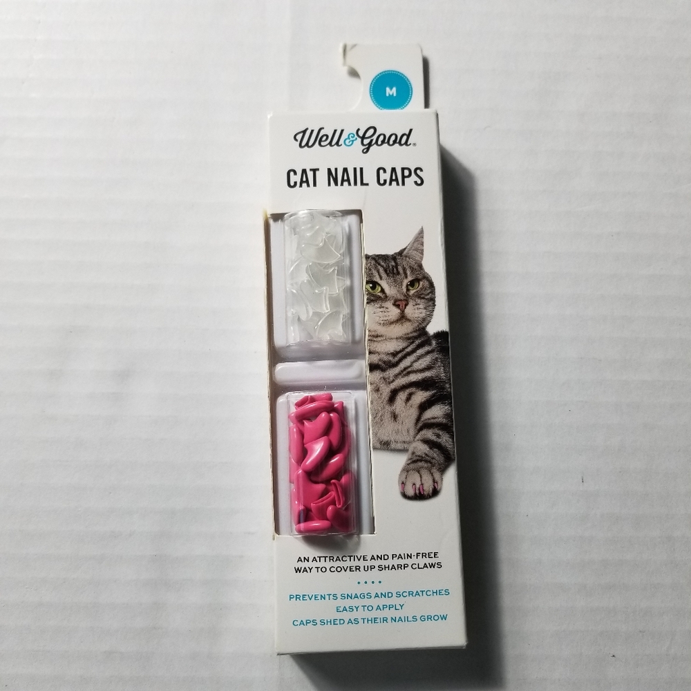 NEW IN BOX WELL AND GOOD CAT NAIL CAPS